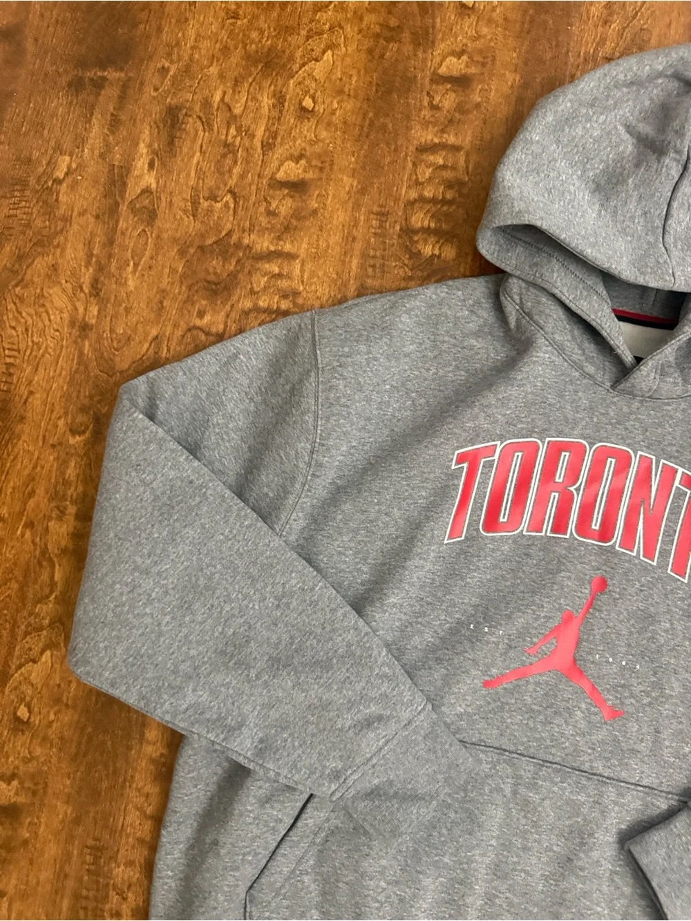 Jordan Toronto Grey Pullover Hoodie with Red Logo